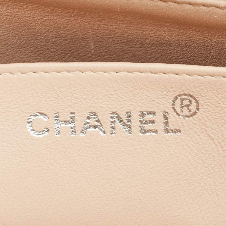 مملوكة مسبقًا حقيبة شانيل جامبو كلاسيك جلد مبطن بيج بقلاب واحد عتيق