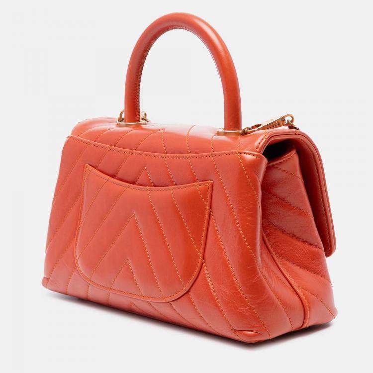 Pre Owned Chanel Orange Mini Chevron Lambskin Coco Top Handle Bag
