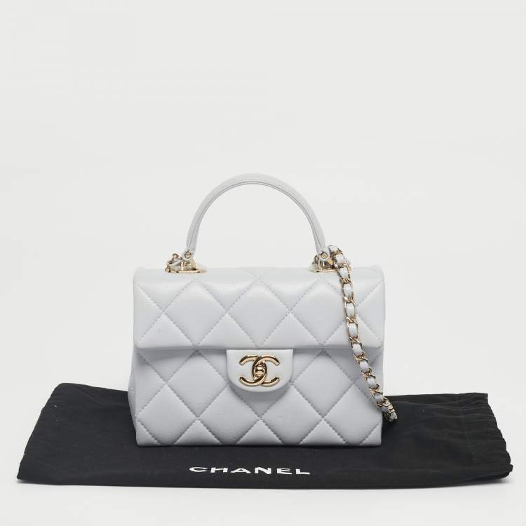 Pre Owned Chanel Blue Quilted Caviar Leather Mini Retro Twist Top Handle Bag