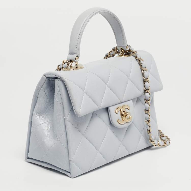 Pre Owned Chanel Blue Quilted Caviar Leather Mini Retro Twist Top Handle Bag