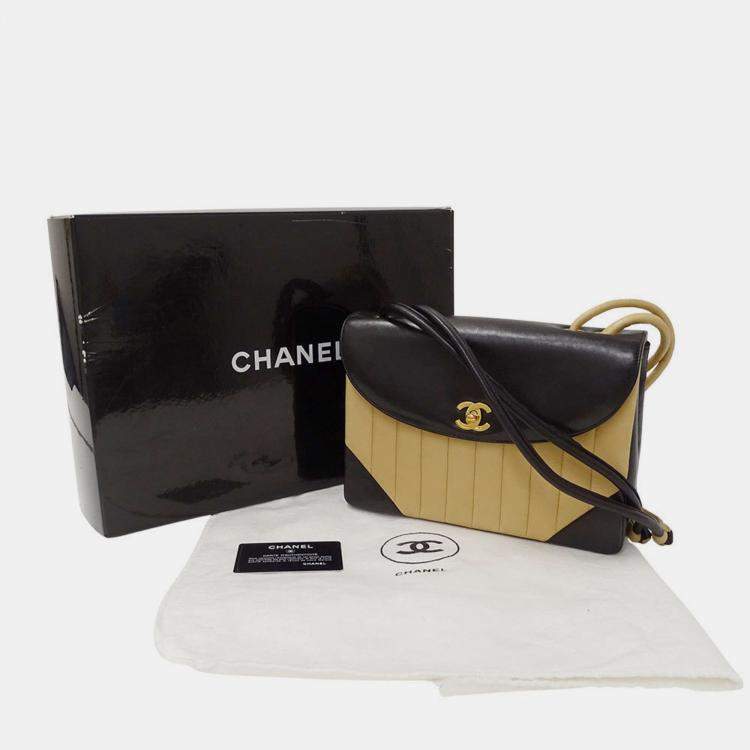 Pre Owned Chanel Mademoiselle Shoulder Bag In Black And Beige Lambskin
