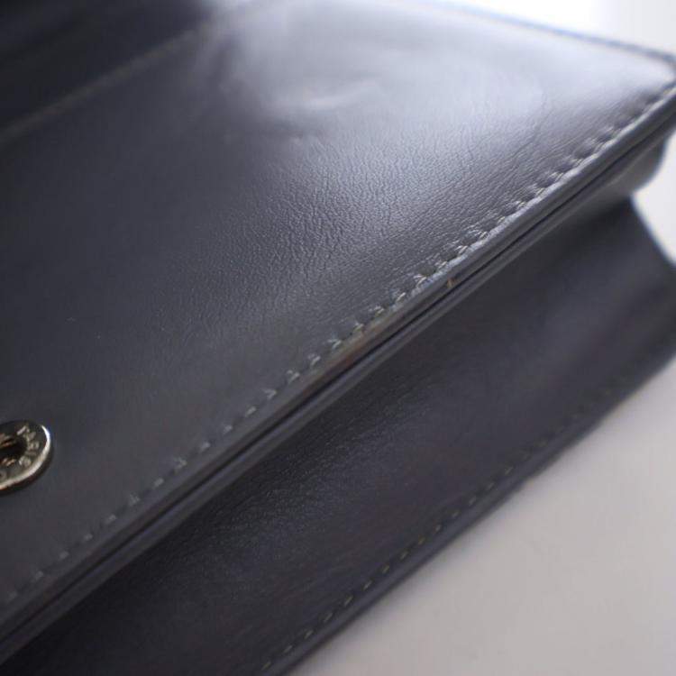 Pre Owned Chanel Patent Camellia Embossed Wallet On Chain