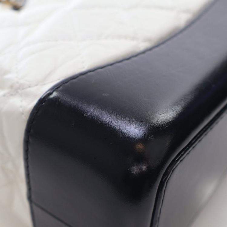 Pre Owned Chanel Small Aged Black/White Calfskin Gabrielle Backpack