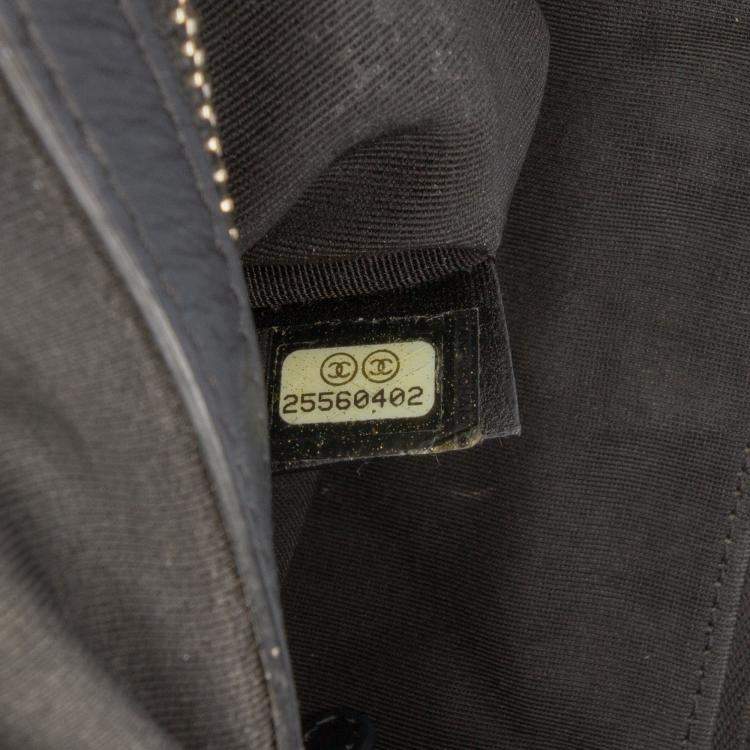 Pre Owned Chanel Black Medium Quilted Caviar Boy O Case Clutch