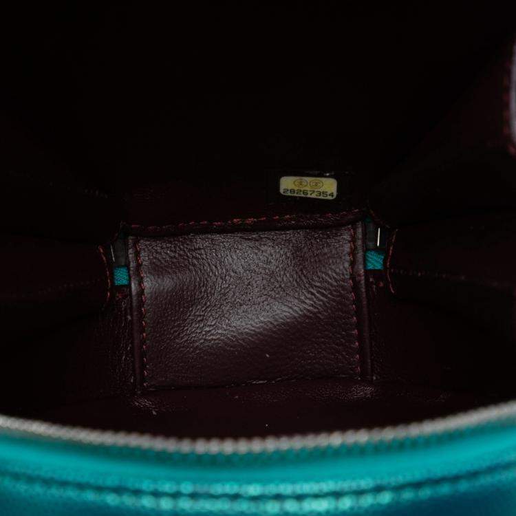 Pre Owned Chanel Blue Quilted Metallic Caviar Rainbow Hardware Oval Camera Bag