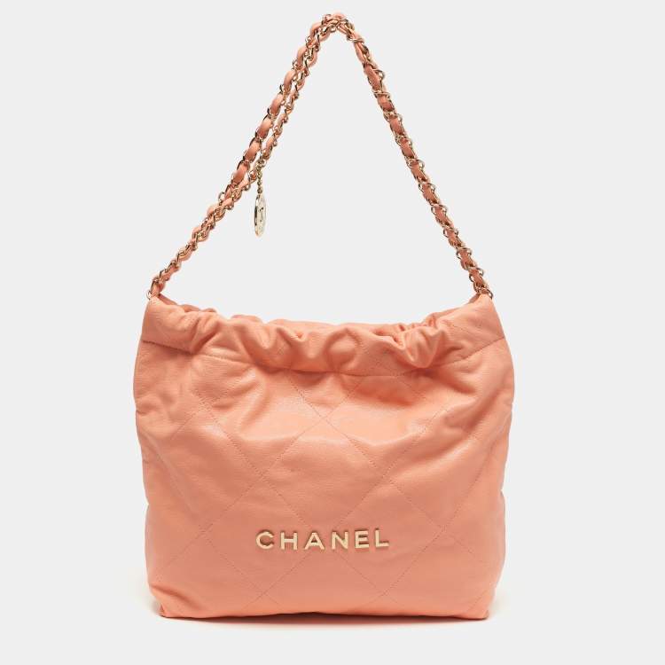 Pre Owned Chanel 22 Small Peach Caviar Quilted Leather Bag
