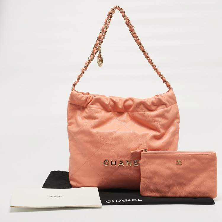 Pre Owned Chanel 22 Small Peach Caviar Quilted Leather Bag