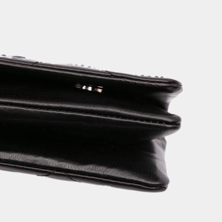 Pre Owned Chanel Black Quilted Calfskin Star Attitude Grommet Fold Over Clutch
