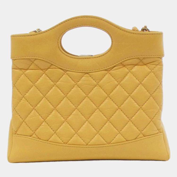 Pre Owned Chanel 31 Line Yellow Leather Handbag