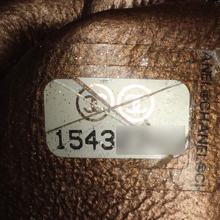 Pre Owned Chanel Reissue 226 Bronze Quilted Caviar Leather Flap Bag