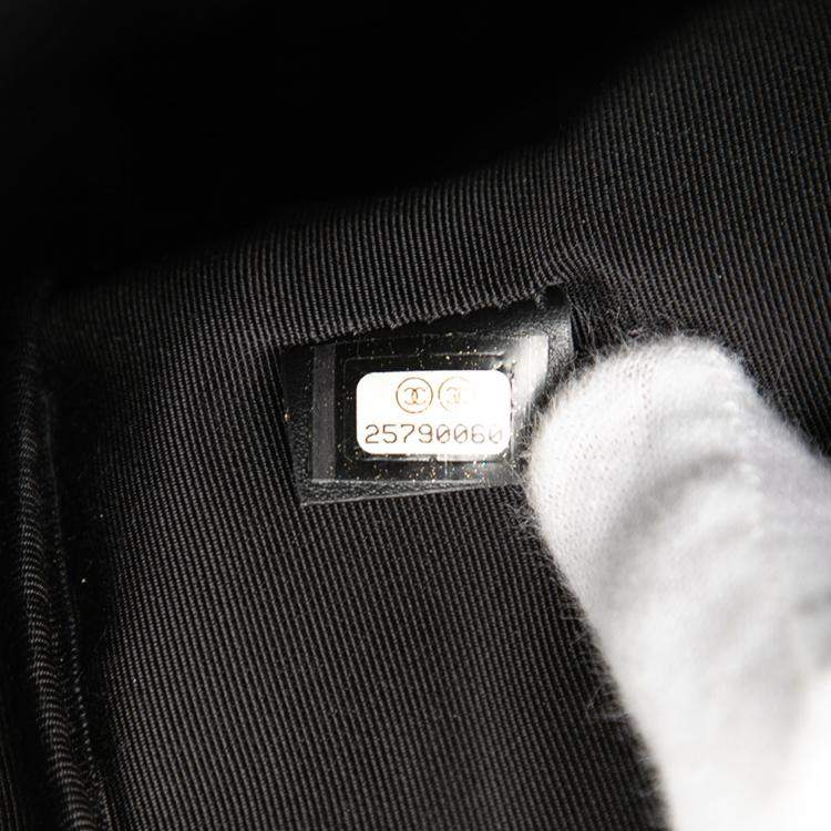 Pre Owned Chanel Black White Coated Canvas Camellia Logo Wristlet Clutch