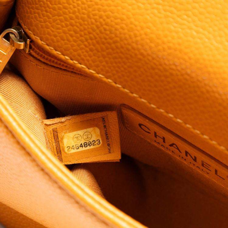 مملوكة مسبقًا Chanel Orange Mini Quilted Caviar Carry Around Flap