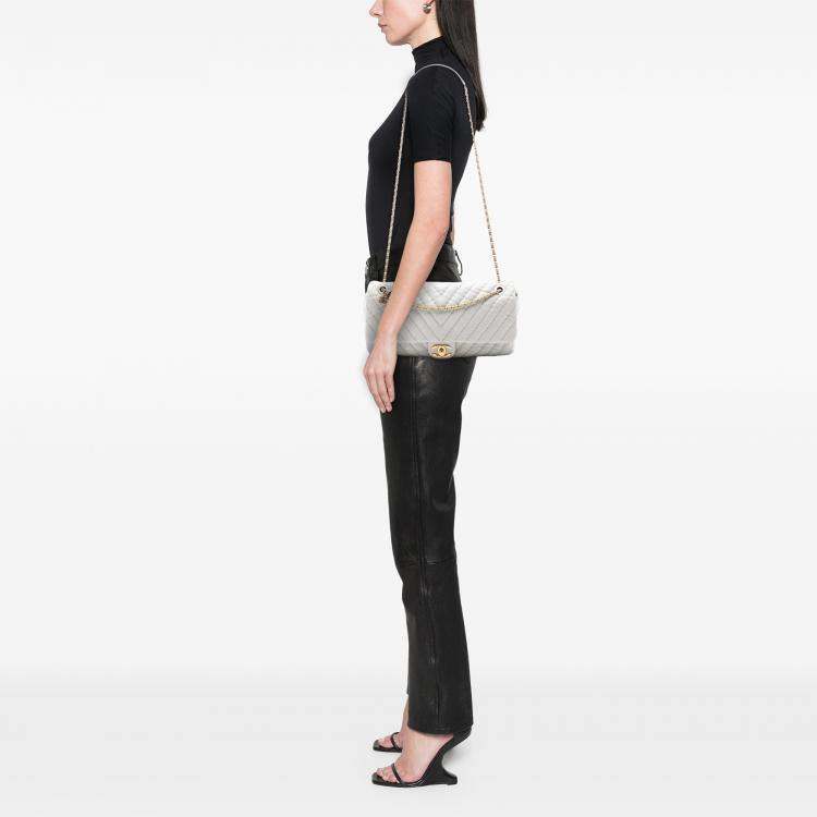 Pre Owned Chanel White Jumbo Chevron Calfskin Surpique Flap