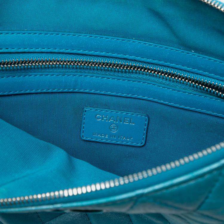 Pre Owned Chanel Blue Medium Quilted Iridescent Lambskin O Case Clutch