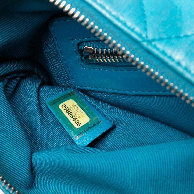 Pre Owned Chanel Blue Medium Quilted Iridescent Lambskin O Case Clutch