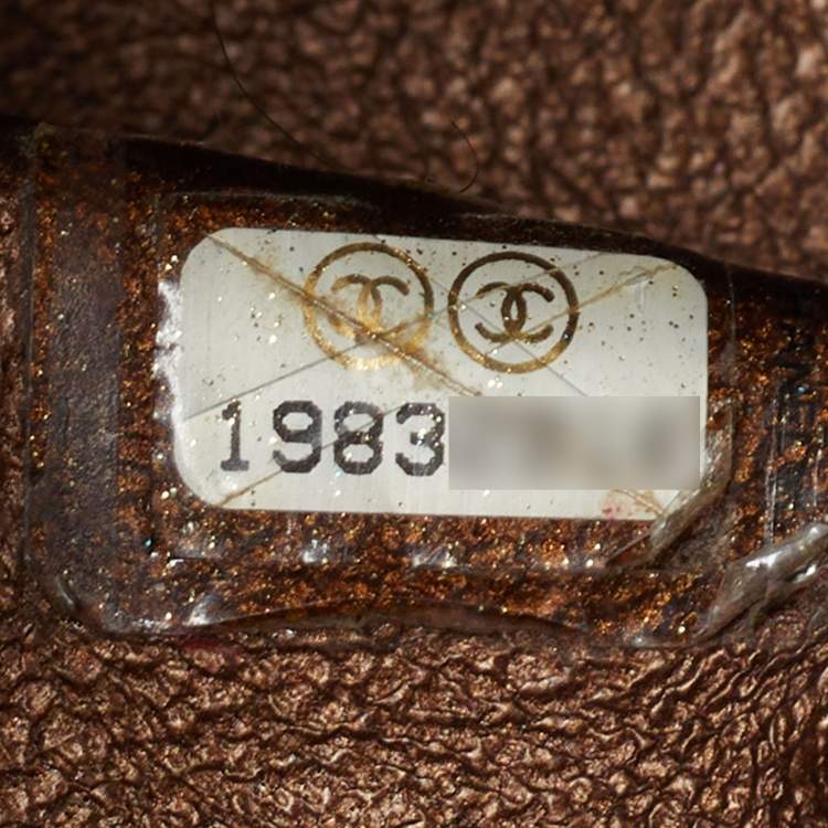 Pre Owned Chanel Reissue 2.55 226 Metallic Brown Quilted Aged Leather Flap Bag