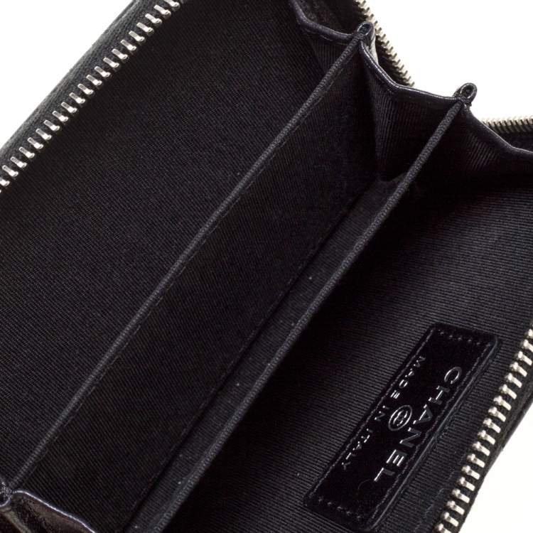 Pre Owned Chanel Black Camellia Embossed Leather Zip Around Coin Purse