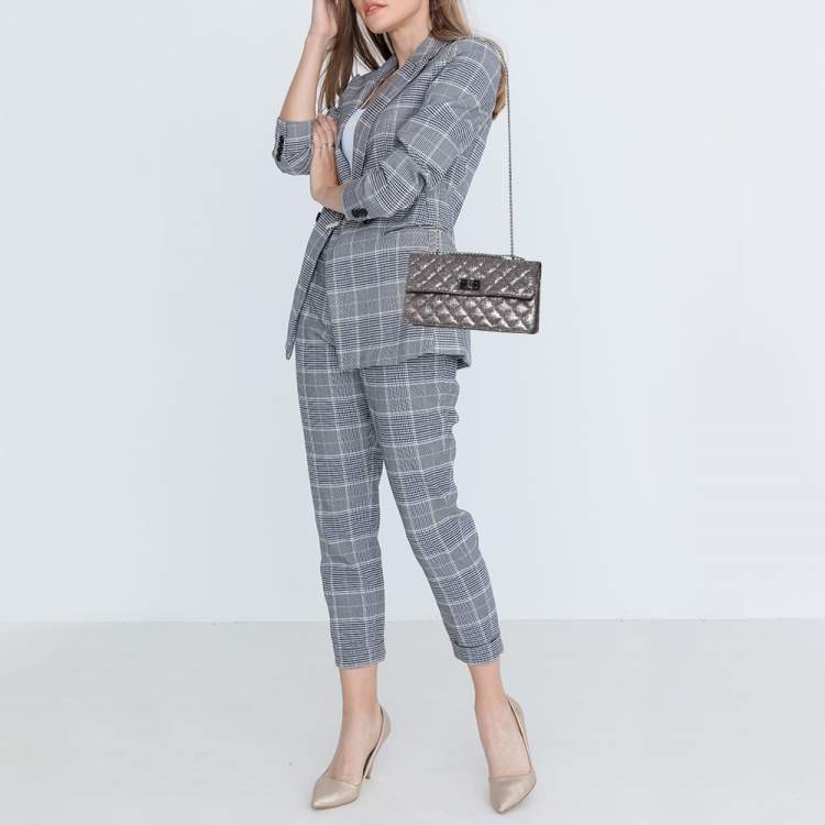 Pre Owned Chanel Silver Quilted Glitter Leather Reissue Flap Bag