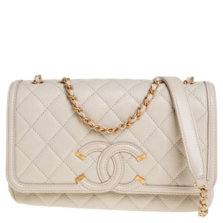 Chanel mini ivory white  White chanel bag, Chanel clutch bag