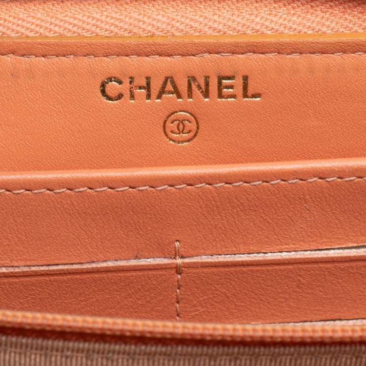 Pre Owned Chanel Orange Quilted Caviar Suede CC Zip Around Wallet