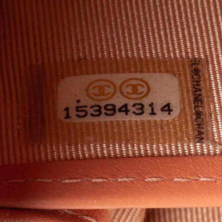 Pre Owned Chanel Orange Quilted Caviar Suede CC Zip Around Wallet