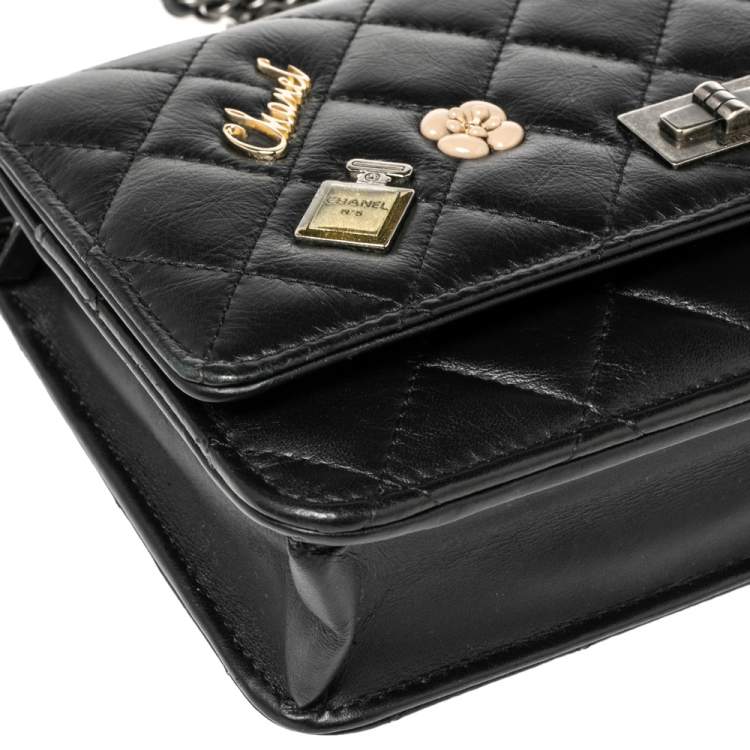 Pre Owned Chanel Black Aged Quilted Leather Lucky Charms 2.55 Reissue Wallet on Chain