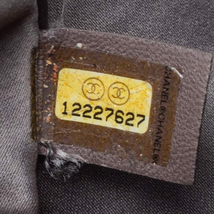 Pre Owned Chanel Black Camellia Embossed Patent Vinyl Accordion Hobo