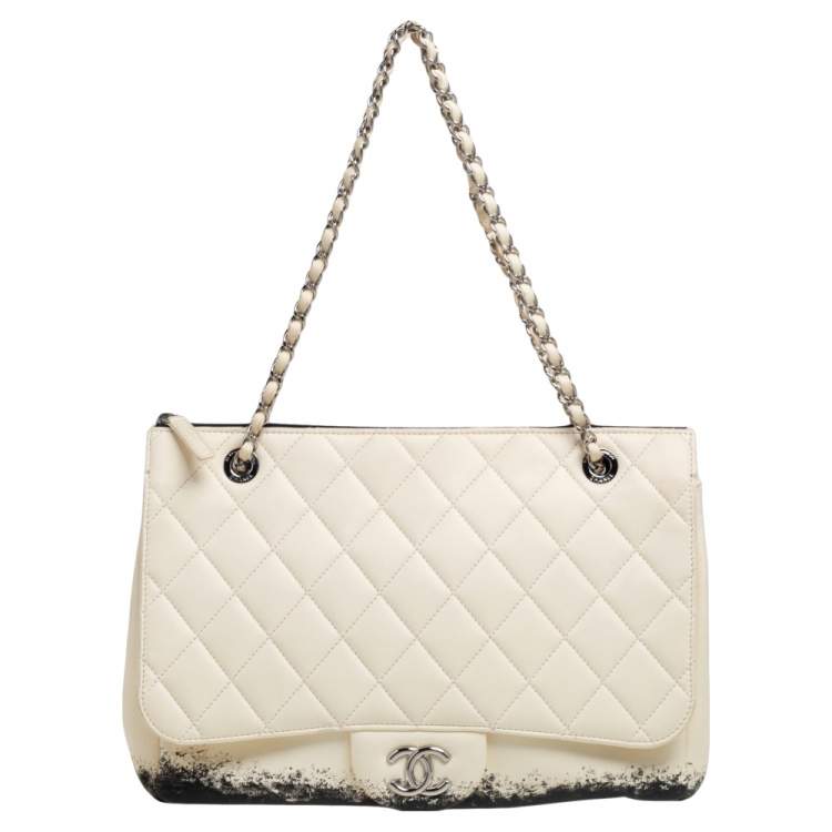 chanel maxi flap bag with top handle