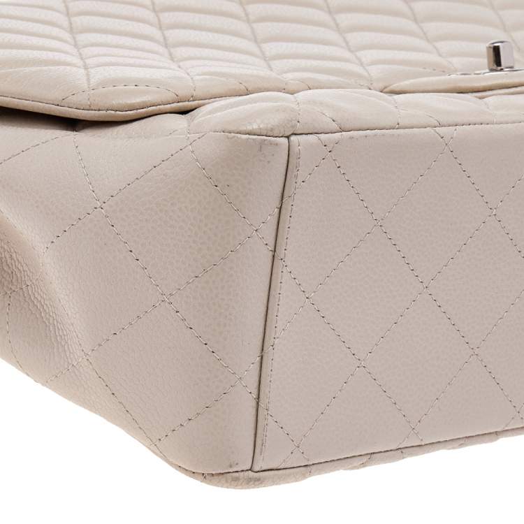 Pre Owned Chanel Beige Quilted Caviar Leather Maxi Classic Single Flap Bag