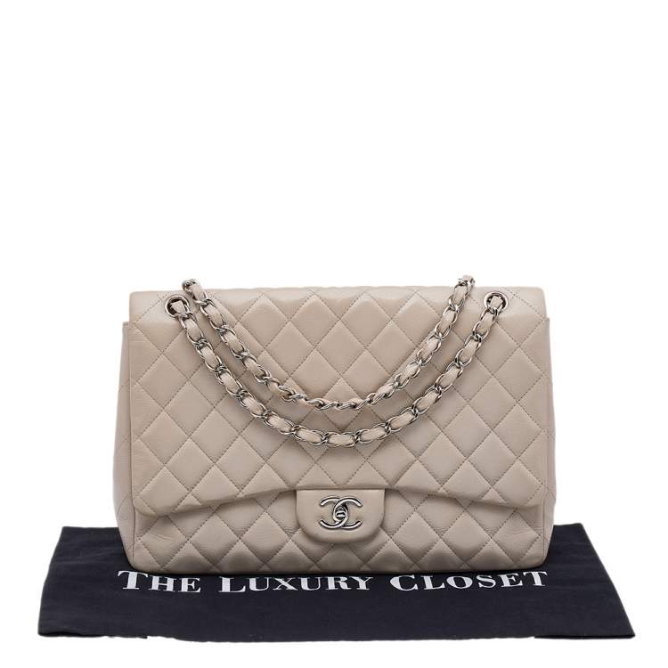 Pre Owned Chanel Beige Quilted Caviar Leather Maxi Classic Single Flap Bag