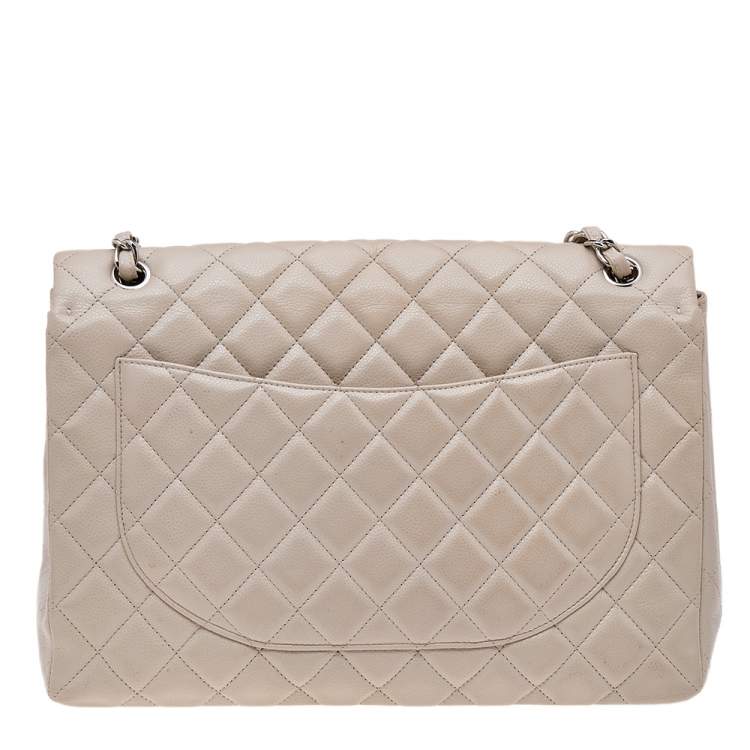 Pre Owned Chanel Beige Quilted Caviar Leather Maxi Classic Single Flap Bag