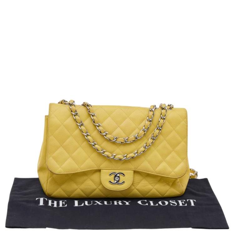 Pre Owned Chanel Yellow Quilted Caviar Leather Jumbo Classic Single Flap Bag