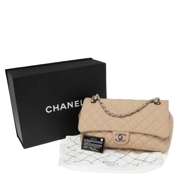 Pre Owned Chanel Beige Quilted Caviar Leather Large Easy Flap Bag