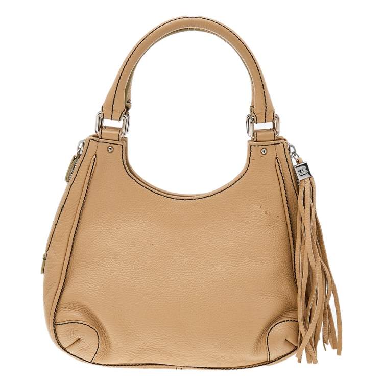 Pre Owned Chanel Beige Grained Leather Tassel Hobo