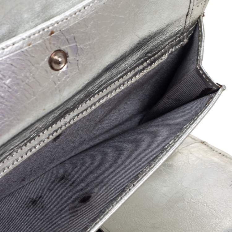 Pre Owned Chanel Silver Quilted Laminated Leather Reissue Trifold Wallet