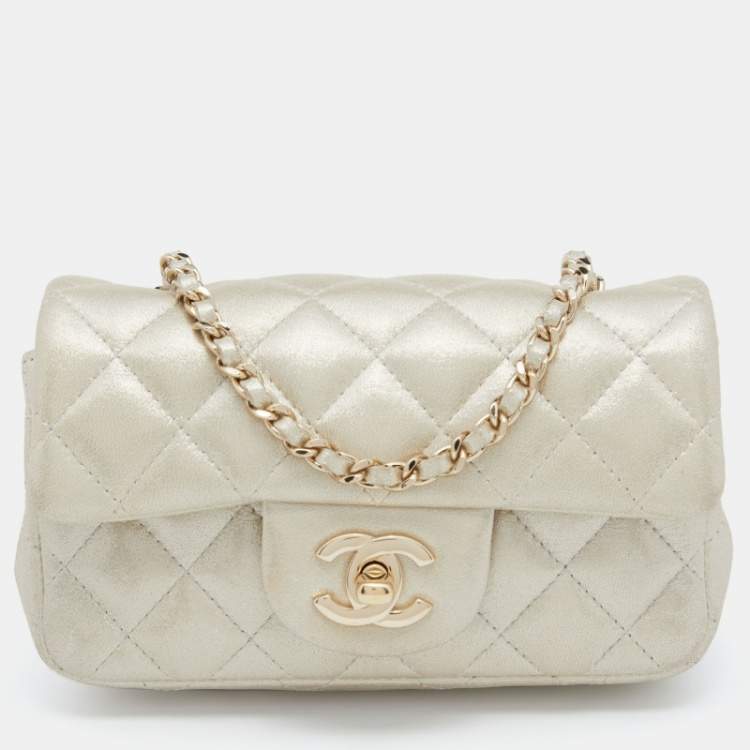 Chanel Champagne Gold Iridescent Quilted Leather Extra Mini Classic Flap  Bag Chanel | The Luxury Closet