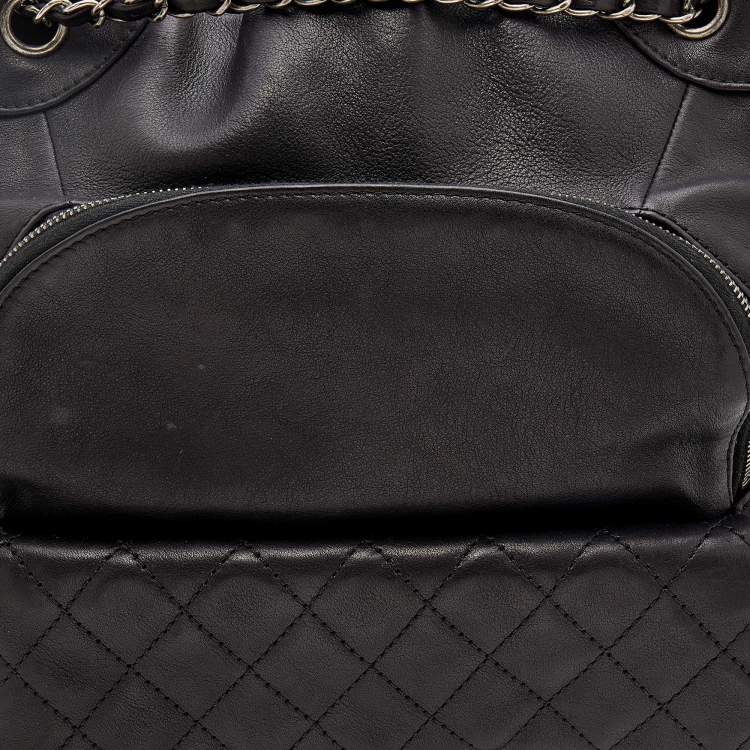 Pre Owned Chanel Black Quilted Leather Small Drawstring CC Flap Backpack 