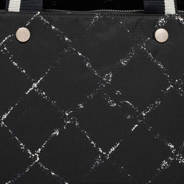 Pre Owned Chanel Black/White Quilted Print Nylon Travel Line Duffel Bag