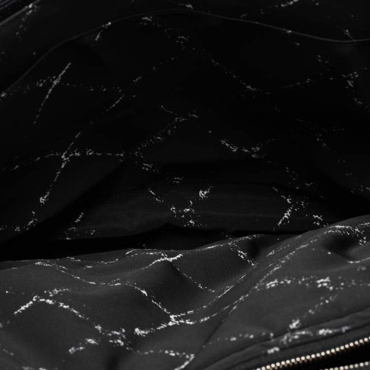 Pre Owned Chanel Black/White Quilted Print Nylon Travel Line Duffel Bag