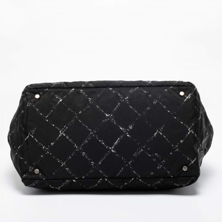Pre Owned Chanel Black/White Quilted Print Nylon Travel Line Duffel Bag