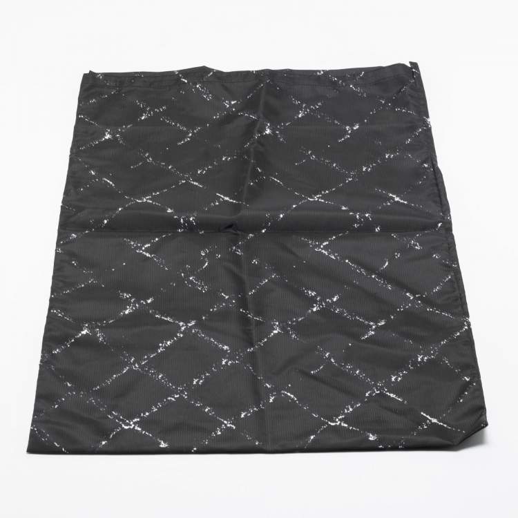 Pre Owned Chanel Black/White Quilted Print Nylon Travel Line Duffel Bag