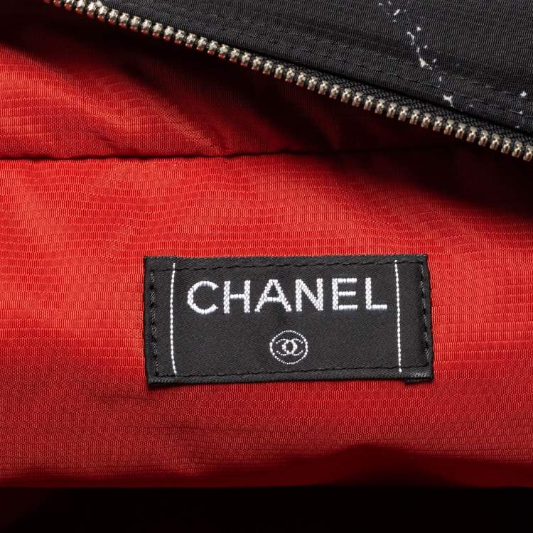 Pre Owned Chanel Black/White Quilted Print Nylon Travel Line Duffel Bag