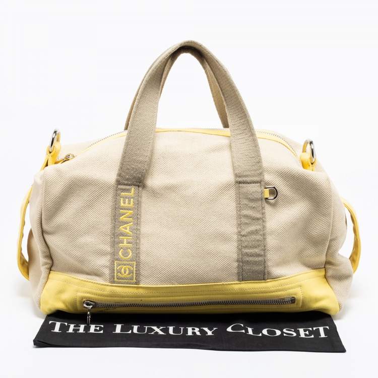Pre Owned Chanel Beige/Yellow Canvas Weekend Boston Bag