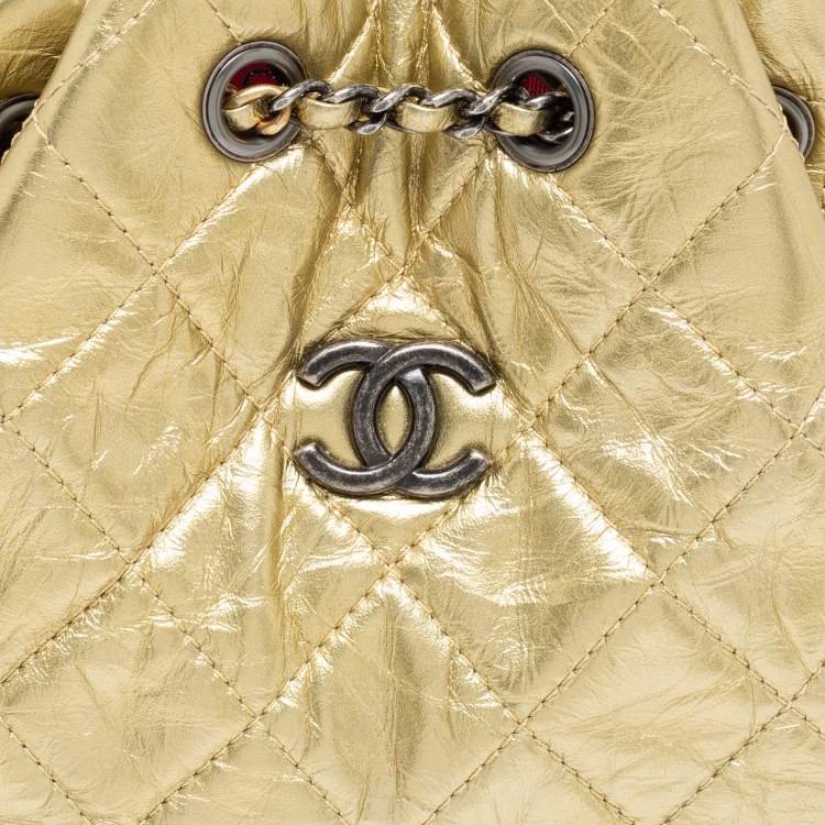 Pre Owned Chanel Metallic Gold Quilted Laminated Leather Small Gabrielle Backpack