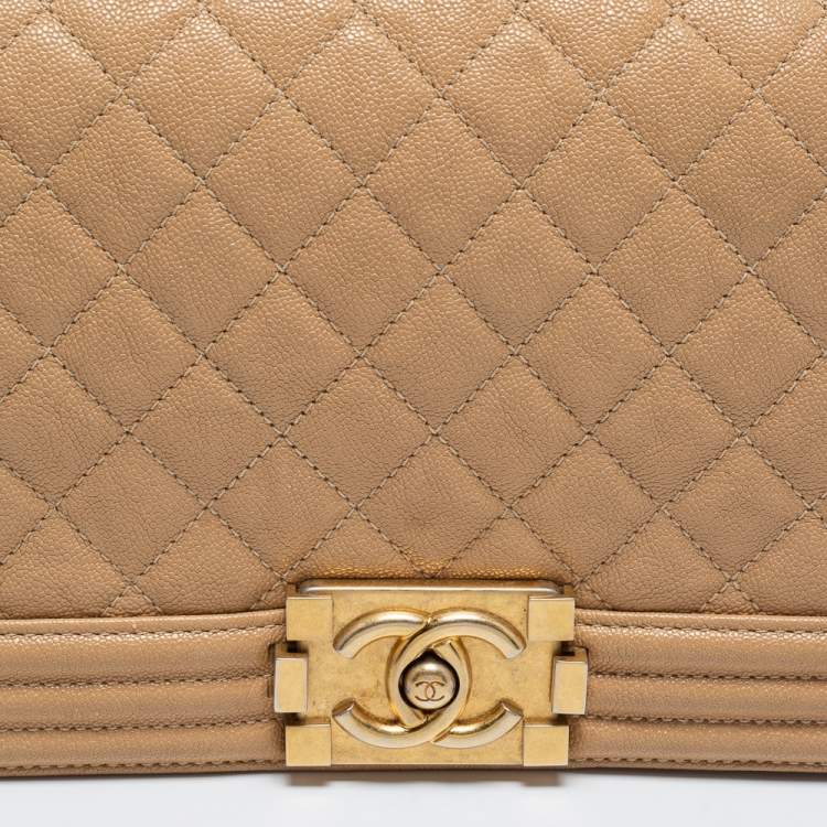 Pre Owned Chanel Beige Quilted Caviar Leather Medium Boy Flap Bag