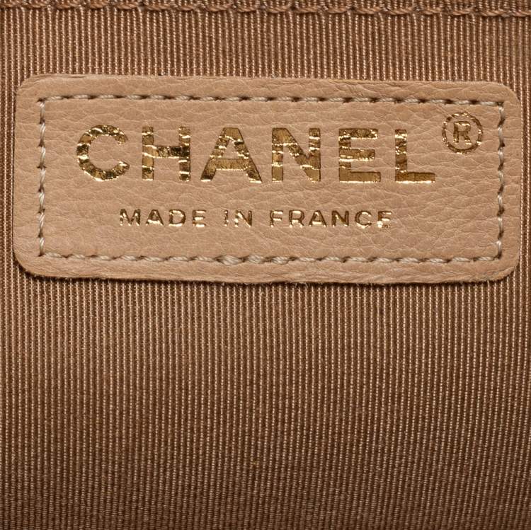 Pre Owned Chanel Beige Quilted Caviar Leather Medium Boy Flap Bag