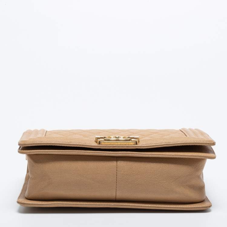 Pre Owned Chanel Beige Quilted Caviar Leather Medium Boy Flap Bag
