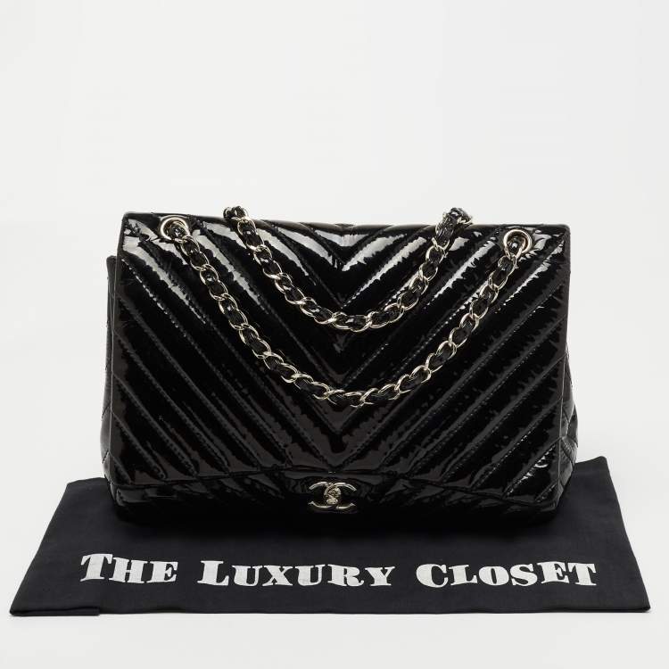 Pre Owned Chanel Black Chevron Patent Leather Maxi Classic Single Flap Bag