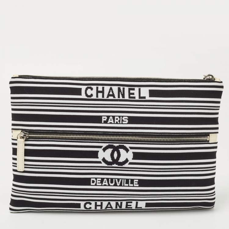 Pre Owned Chanel Black/White Stripe Fabric and Leather Zip Wristlet Clutch