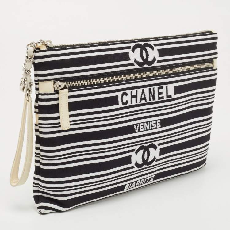 Pre Owned Chanel Black/White Stripe Fabric and Leather Zip Wristlet Clutch